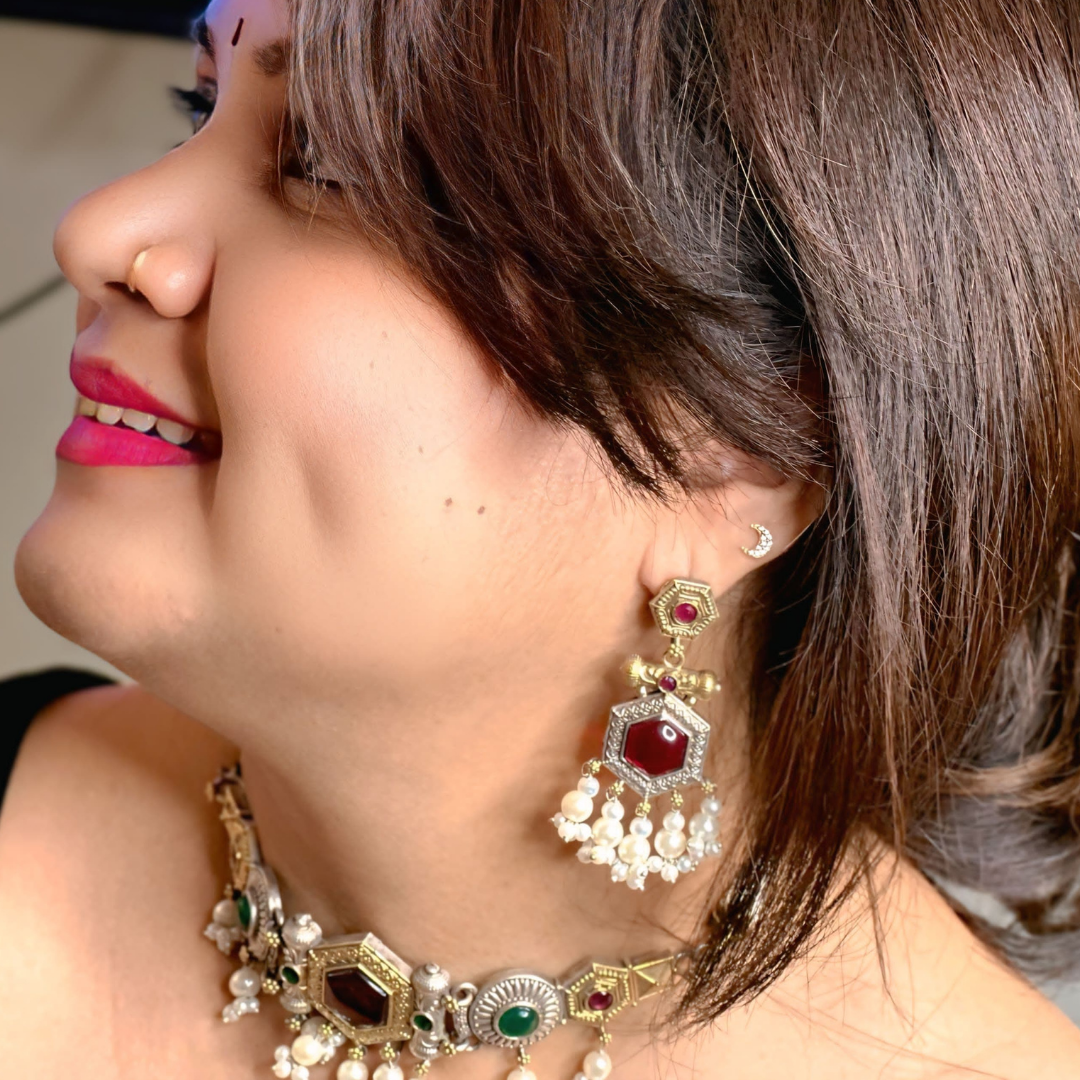 Stunning antique choker set with intricate detailing, pearls, and vibrant gemstones for a regal charm