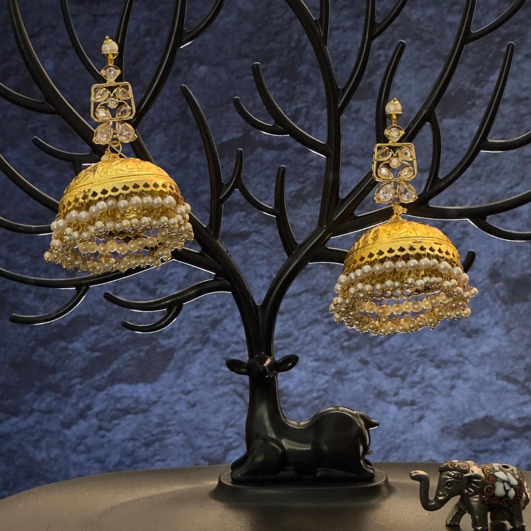 Gold-toned Jhumkas with delicate pearls